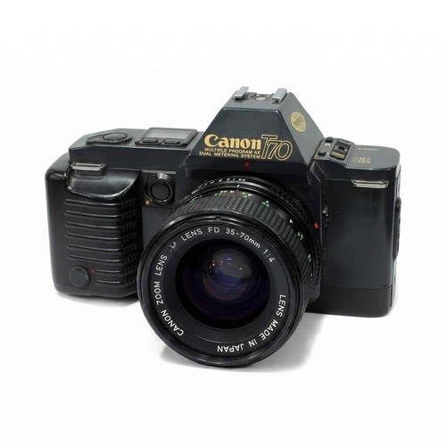 Canon t70 - +,